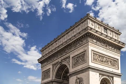 Arc de Triomphe (against the background of sky with clouds), Paris, France Stock Photos