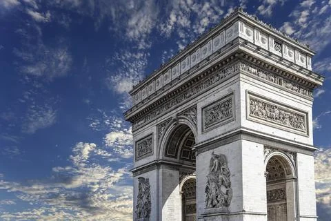 Arc de Triomphe (against the background of sky with clouds), Paris, France Stock Photos