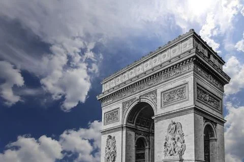 Arc de Triomphe (against the background of sky with clouds), Paris, France Stock Photos