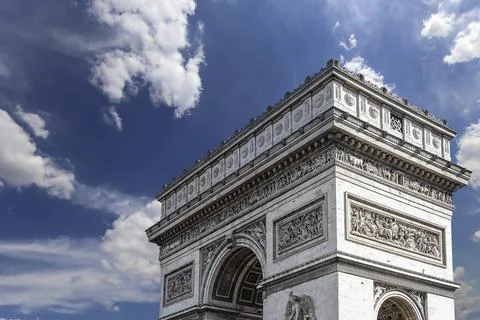 Arc de Triomphe (against the background of sky with clouds), Paris, France Stock Photos