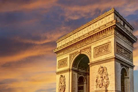 Arc de Triomphe (against the background of sky with clouds), Paris, France Stock Photos