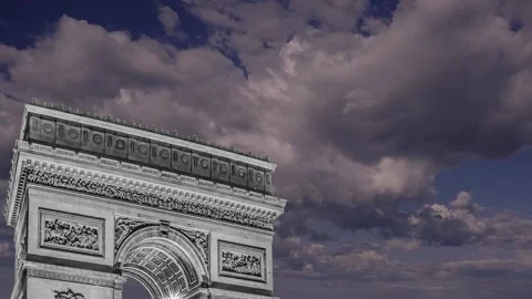 Arc de Triomphe (against the moving clouds, 4K), with zoom, Paris, France Video stock 241104332