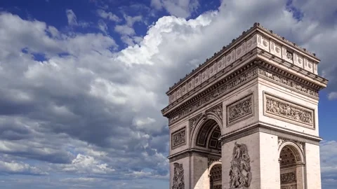 Arc de Triomphe (against the moving clouds, 4K), with zoom, Paris, France Video stock 241104564
