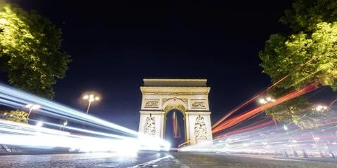 Arc de Triomphe and car lights at night Stock-Fotos