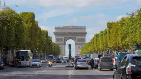 Arc de Triomphe and Champs Elysees traffic pan Stock-Footage 58596445