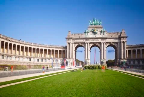 Arc de Triomphe in Brussels, Belgium. Long exposure shot with warm evening li Stock Photos