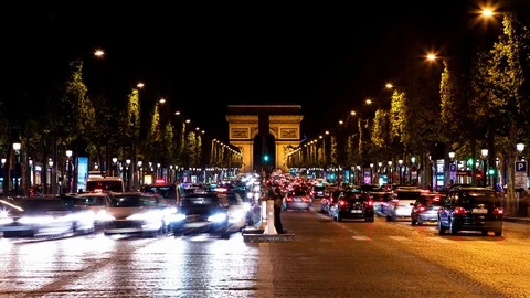 Arc de Triomphe &amp; Champs Elysees time lapse at night Stockbeeldmateriaal 119032704