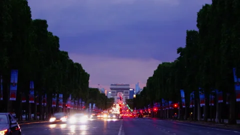 Arc de Triomphe at dusk, Paris, France and Champs Elysees time lapse zoom in Stock Footage 150402016