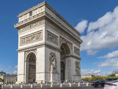 The Arc de Triomphe, a major monument in Paris, France, against a beautiful sky Stock Photos