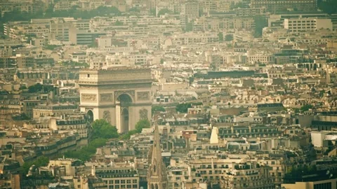 Arc de Triomphe or Triumphal Arch of the Star within cityscape of Paris, France Stock Footage 246069609