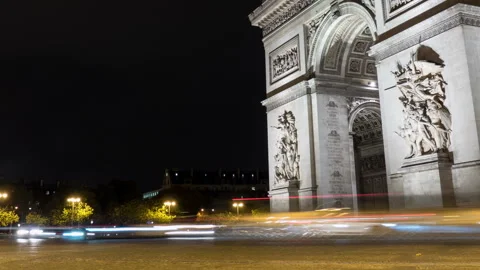 Arc de Triomphe  in Paris at chilly night from a timelapse perspective Stock Footage 98972216
