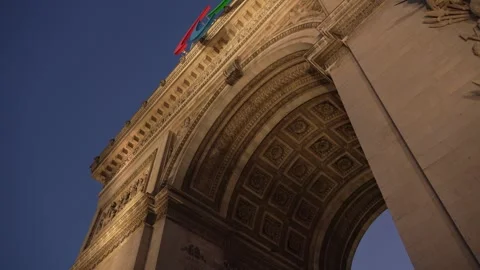 Arc de Triomphe in Paris with the emblem of the Paralympic Games at sunset in 스톡 동영상 282210085