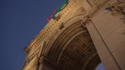 Arc de Triomphe in Paris with the emblem of the Paralympic Games at sunset in 스톡 동영상 282210093