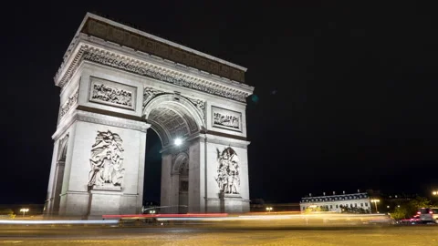 Arc de Triomphe  in Paris at magic night from a timelapse perspective Stock Footage 98857481