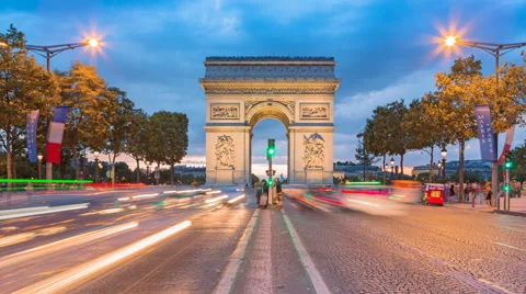 Arc de Triomphe - Paris traffic on Champs-Elysees at night 4k Stock Footage 65455960