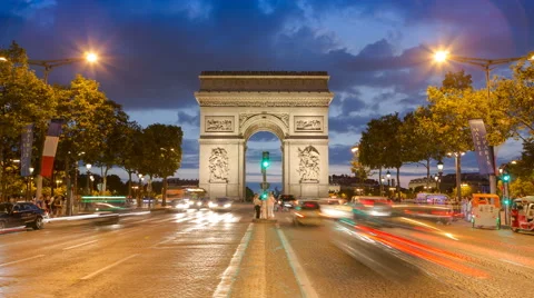 Arc de Triomphe - Paris traffic on Champs-Elysees at night 4k Stock Footage 65696903