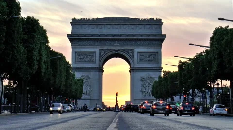 Arc De Triumph at sunset, seen from Champs Elysees Stock Footage 61251295