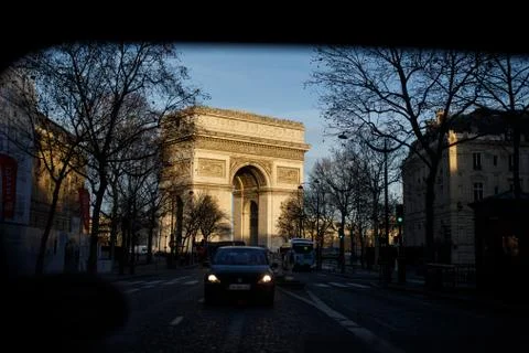 The Arc du Triomphe seen through the back window of a car in Paris Stock Photos