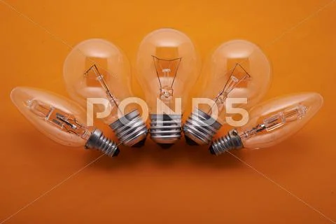 Arc lamps set on an orange background Stock Photos