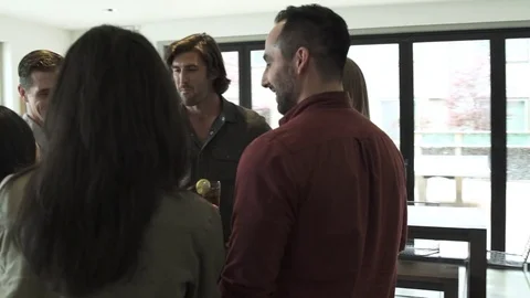 Arc shot of friends toasting Stock-Footage 76234860