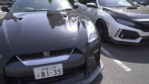 Arc Shot of a Parked Black Phoenix Power SPL Nissan GTR. Stock Footage 142407638
