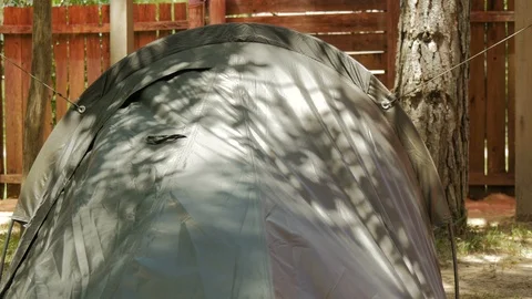 Arc of a small single person tent mounted. Video stock 87722544