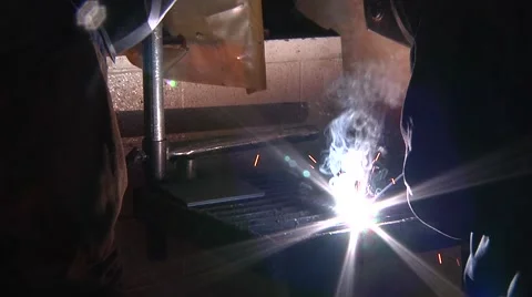 Arc welder being used by welding student with great arc flash Stock Footage 56436032