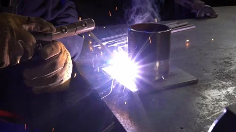 Arc Welder with Sparks. Profile Angle. Slow Motion Stock Footage 254744586