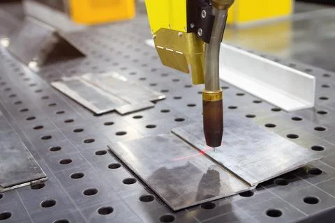 Arc welding robot. Example of working with a laser pointer Stock Photos