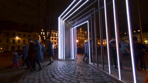 Arc of white LED light with timer on STARO RIGA night life festival Stockbeeldmateriaal 92917060