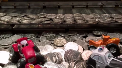 Arcade / Amusement Coin Pusher Machine - Silver Coins With Prizes 1080p Stock Footage 43236441