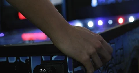 Arcade: Anonymous Man Playing Pinball Stock Footage