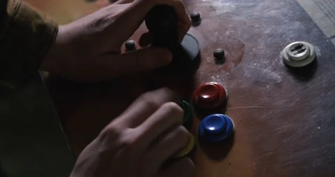 Arcade: Anonymous Man Playing Video Game With Joystick And Buttons Stock Footage 107945309