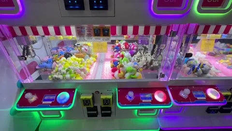 Arcade Claw Machine; Mini Plushies; Toys, Games, Fun. Stock Footage 242096704