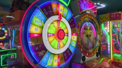 Arcade game spinning with glowing neon lights Stock Footage 340130684