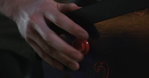 Arcade: Hand Using Flipper To Face Of Man Playing Pinball Stock Footage 107945590
