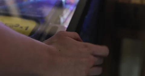 Arcade: Man Using Flippers On Pinball Machine Stock Footage 107945518