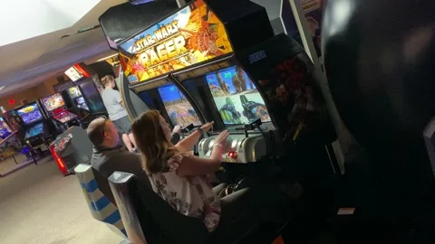 Arcade - People Playing Star Wars Video Game Stock Footage 157734151
