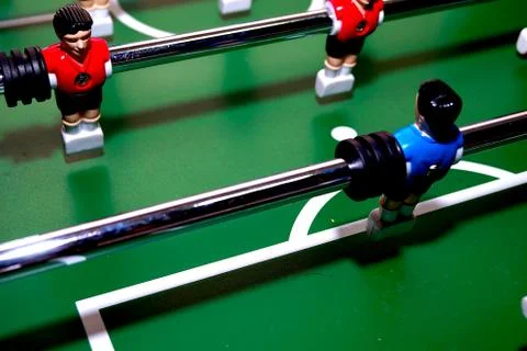 Arcade table soccer with tools for playing for office and home games. Stock Photos