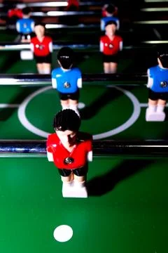 Arcade table soccer with tools for playing for office and home games. Stock Photos