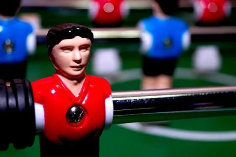 Arcade table soccer with tools for playing for office and home games. Stock Photos