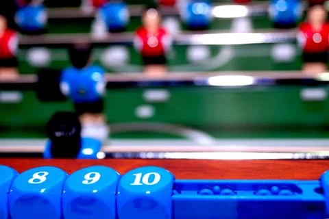 Arcade table soccer with tools for playing for office and home games. Stock Photos