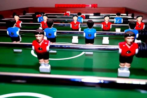 Arcade table soccer with tools for playing for office and home games. Stock Photos