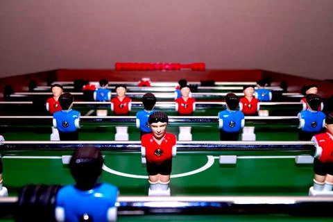 Arcade table soccer with tools for playing for office and home games. Stock Photos