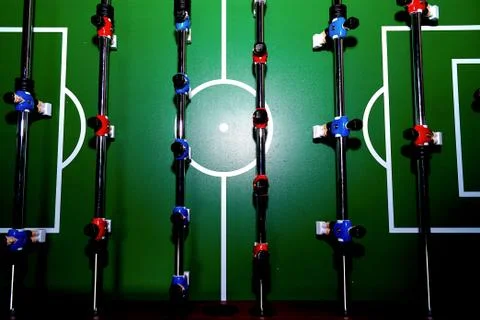 Arcade table soccer with tools for playing for office and home games. Stock Photos