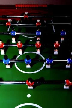 Arcade table soccer with tools for playing for office and home games. Stock Photos