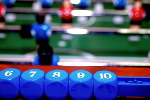 Arcade table soccer with tools for playing for office and home games. Stock Photos