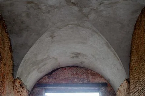 Arch arch as an architectural solution at the gates of the fortress. Stock Photos