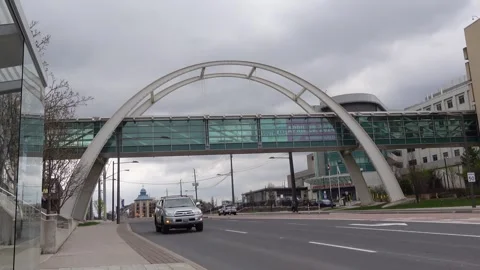 Arch bridge above Davis Drive in Newmarket, Canada Stock Footage 274425623