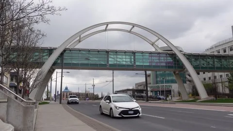 Arch bridge above Davis Drive in Newmarket, Canada Stock Footage 274425628